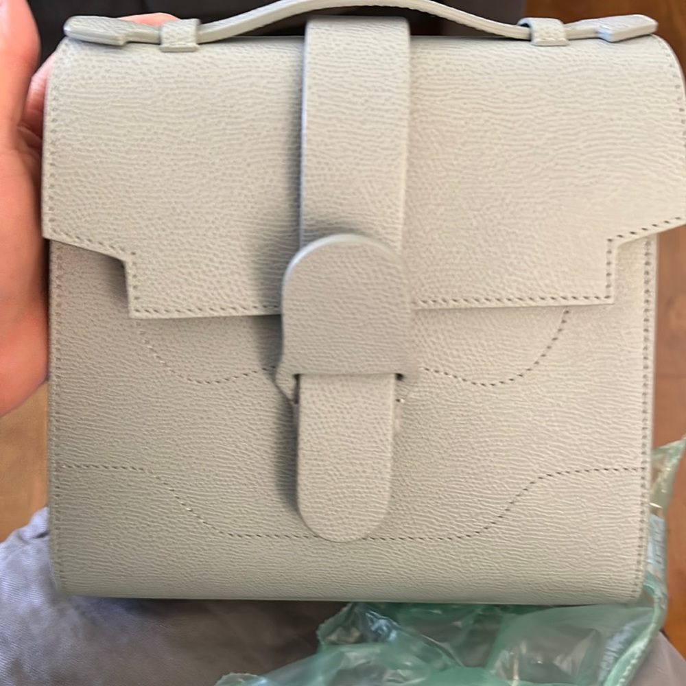 Like new Senreve Alunna Bag Pebbled leather with silver hardware. Color is Ice